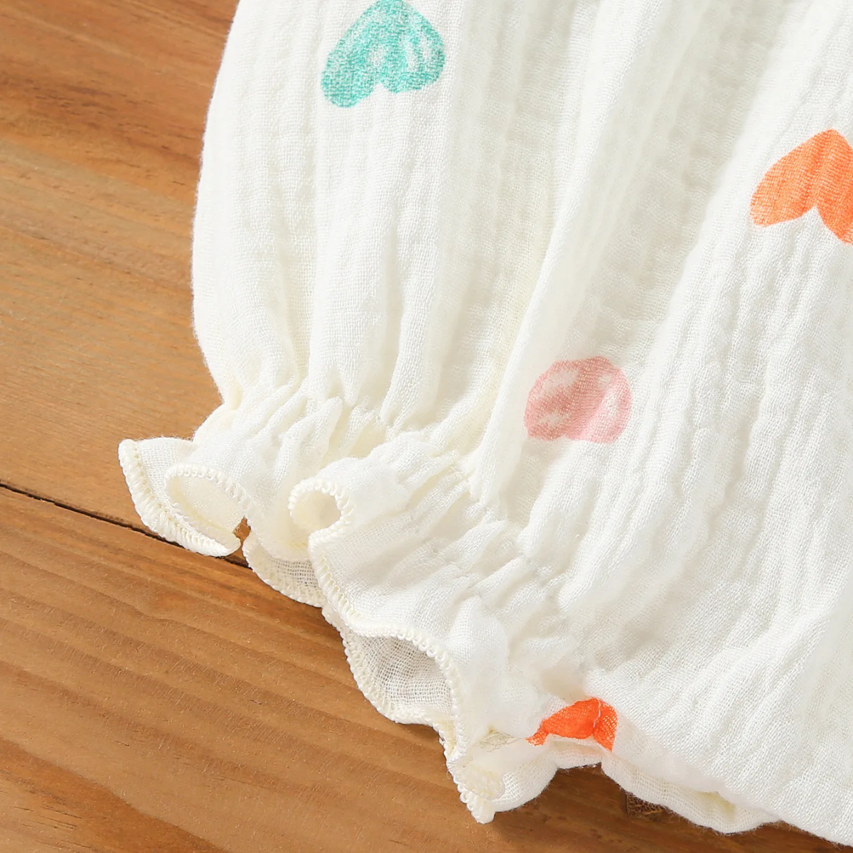 LittleBlossom – Letni komfort i styl – body dla niemowląt z czapeczką