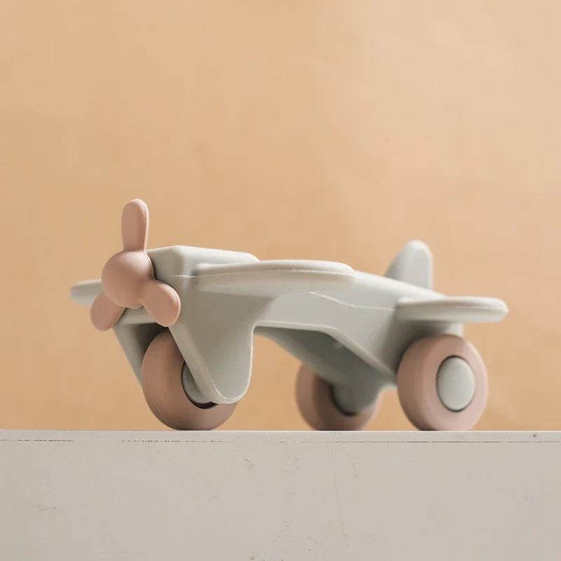 Mini Motion™ – Toczenie i gryzienie - silikonowe zabawki do pojazdów