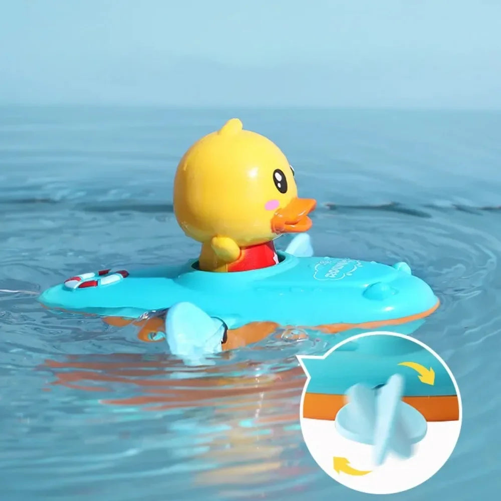 Little Duck Swim™ – Przyjaciel do kąpieli Splash Fun - gumowa kaczka do wiosłowania