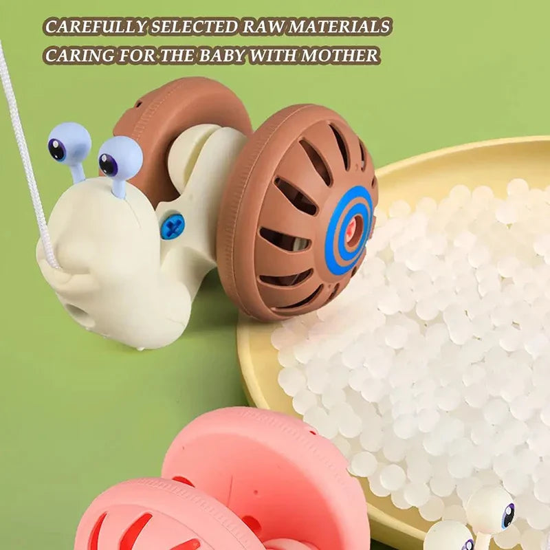 Snail Toy™ - Ślimak na kółkach - Zabawka Montessori